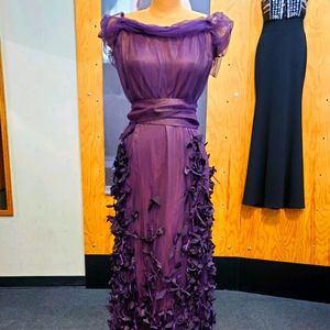 Long purple dress by Linda Lundstrom